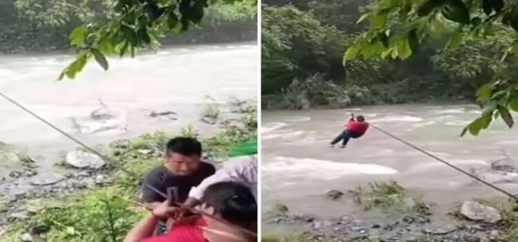 Sin puente, pobladores de Hidalgo cruzan río en tirolesa improvisada Sin puente, pobladores de Hidalgo cruzan río en tirolesa improvisada