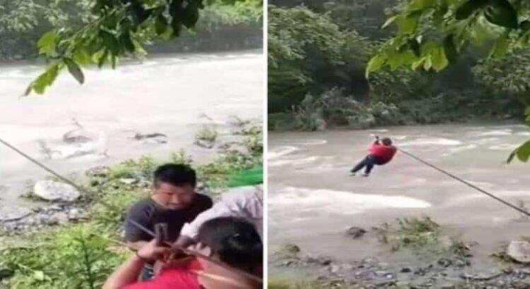 Sin puente, pobladores de Hidalgo cruzan río en tirolesa improvisada