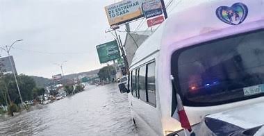 Lluvias en Pachuca provocan inundaciones y rescate de una persona en canal de agua